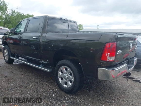 2014 Ram 2500 Big Horn with VIN 3C6UR5DJ4EG189320, listed as a IAAI auction lot 42287502 with 163,728 mi miles and . Bid and sale history available at DreamBid. Image 3.