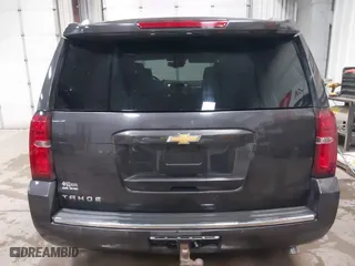 2016 Chevrolet Tahoe LTZ with VIN 1GNSKCKC7GR455033, listed as a IAAI auction lot 40811560 with 165,845 mi miles. Bid and sale history available at carsss.com. Image 16.