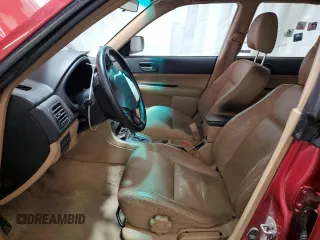 2003 Subaru Forester XS with VIN JF1SG65653H768671, listed as a Copart auction lot 77345174 with 0 mi miles and Salvage Title. Bid and sale history available at carsss.com. Image 7.