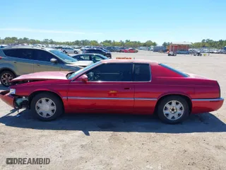 2002 Cadillac Eldorado ESC with VIN 1G6EL12Y72B102153, listed as a IAAI auction lot 41861541 with 91,273 mi miles. Bid and sale history available at carsss.com. Image 14.