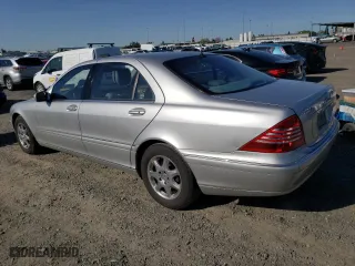 2002 Mercedes-Benz S-Class 5.0L with VIN WDBNG75JX2A306811, listed as a Copart auction lot 52042105 with 206,531 mi miles and Salvage Title. Bid and sale history available at carsss.com. Image 2.