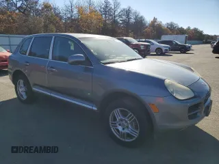 2005 Porsche Cayenne S with VIN WP1AB29P05LA62657, listed as a Copart auction lot 77715144 with 28,210 mi miles and Clean Title. Bid and sale history available at carsss.com. Image 4.