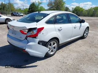 2013 Ford Focus SE with VIN 1FADP3F23DL218239, listed as a IAAI auction lot 42331440 with 156,501 mi miles and . Bid and sale history available at DreamBid. Image 4.