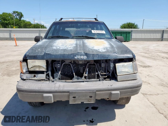 1995 Jeep Grand Cherokee Laredo z VIN 1J4FX58S9SC534442, wystawiony jako Copart lot #61233725 z przebiegiem 363 688 mil mil oraz Szkoda całkowita • Salvage title. Historia ofert i sprzedaży dostępna na DreamBid. Obrazek 5.