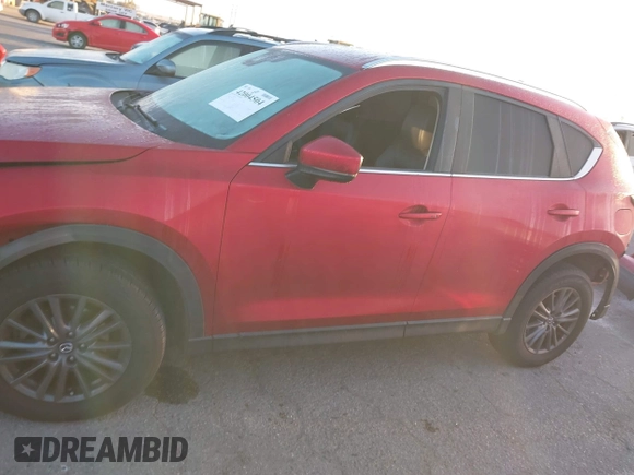 2020 Mazda CX-5 Touring z VIN JM3KFACM1L0855474, wystawiony jako IAAI lot #42004504 z przebiegiem 82 505 mil mil oraz . Historia ofert i sprzedaży dostępna na DreamBid. Obrazek 14.