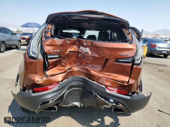 2021 Cadillac XT4 FWD Sport with VIN 1GYFZER49MF057541, listed as a Copart auction lot 70654544 with 35,441 mi miles and Non Repairable. Bid and sale history available at DreamBid. Image 6.