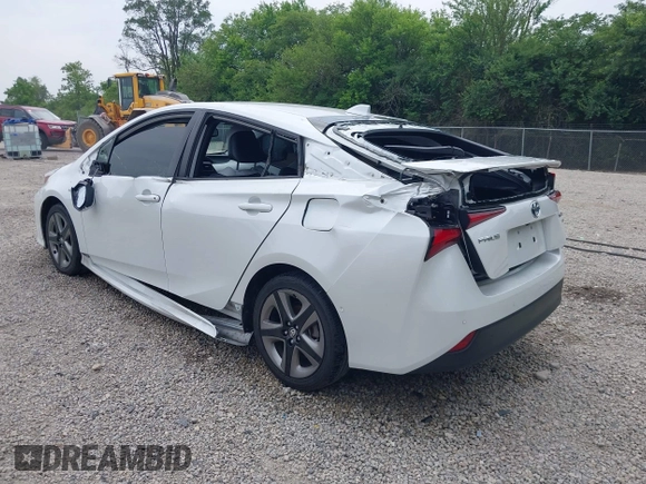 2021 Toyota Prius L Eco with VIN JTDKAMFU6M3137679, listed as a IAAI auction lot 42488129 with 52,414 mi miles and . Bid and sale history available at DreamBid. Image 3.