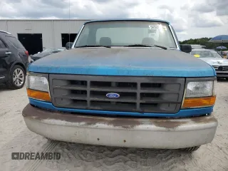 1995 Ford F-150 z VIN 1FTDF15Y7SNA97918, wystawiony jako Copart lot #56505725 z przebiegiem 296 106 mil mil oraz Czysty tytuł • Clean title. Historia ofert i sprzedaży dostępna na DreamBid. Obrazek 5.
