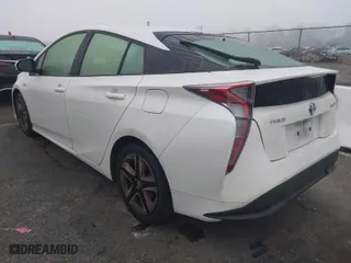 2017 Toyota Prius Two with VIN JTDKARFUXH3037751, listed as a IAAI auction lot 41471974 with 140,787 mi miles. Bid and sale history available at carsss.com. Image 3.