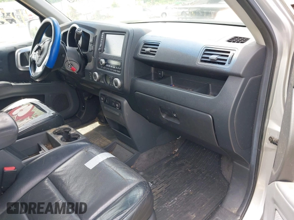 2006 Honda Ridgeline RTL with VIN 2HJYK16566H550339, listed as a IAAI auction lot 42223323 with 240,372 mi miles and . Bid and sale history available at DreamBid. Image 5.