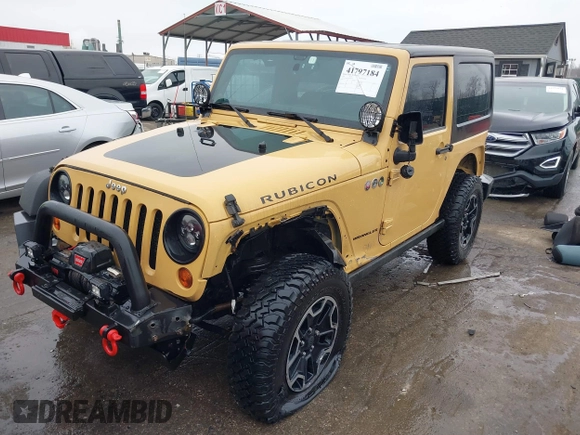 2013 Jeep Wrangler Rubicon 10th Anniversary with VIN 1C4BJWCG5DL688504, listed as a IAAI auction lot 41797184 with 109,414 mi miles and . Bid and sale history available at DreamBid. Image 17.