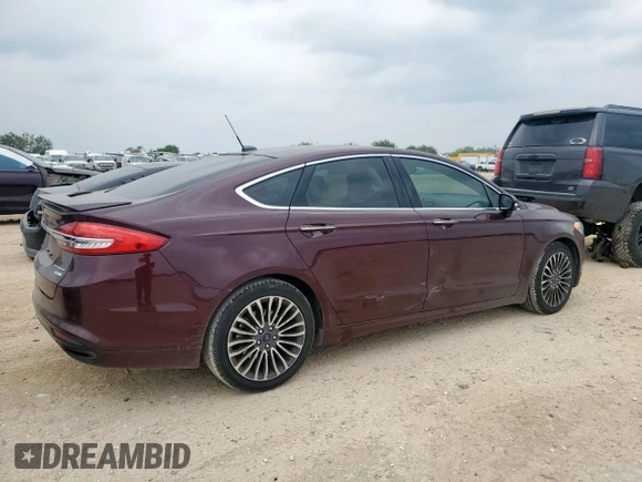 2017 Ford Fusion Titanium with VIN 3FA6P0K90HR178834, listed as a Copart auction lot 57420795 with 127,977 mi miles and Salvage title. Bid and sale history available at DreamBid. Image 3.
