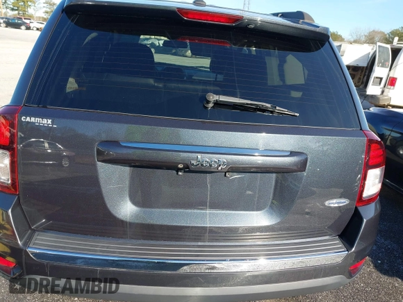 2015 Jeep Compass High Altitude Edition with VIN 1C4NJCEA0FD210511, listed as a IAAI auction lot 41209237 with 79,721 mi miles. Bid and sale history available at carsss.com. Image 16.