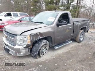 2012 Chevrolet Silverado 1500 LT with VIN 1GCNKSE00CZ326935, listed as a IAAI auction lot 41445520 with 121,035 mi miles. Bid and sale history available at carsss.com. Image 2.