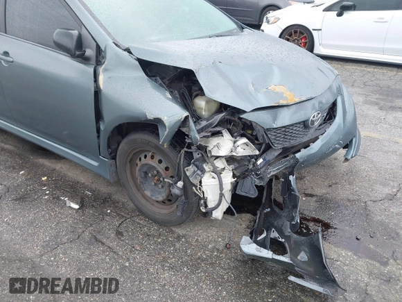 2009 Toyota Corolla with VIN 1NXBU40E49ZO81912, listed as a IAAI auction lot 41806599 with 216,989 mi miles. Bid and sale history available at carsss.com. Image 13.