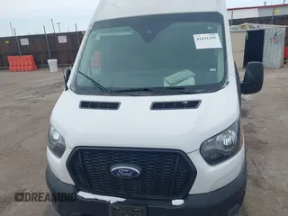 2023 Ford Transit Cargo with VIN 1FTBR2X87PKA51211, listed as a IAAI auction lot 41631315 with 42,688 mi miles and . Bid and sale history available at DreamBid. Image 6.