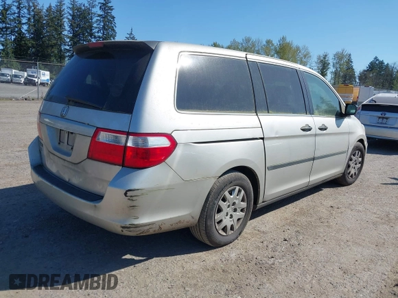 2006 Honda Odyssey LX with VIN 5FNRL38236B127129, listed as a IAAI auction lot 42041994 with 282,313 mi miles. Bid and sale history available at carsss.com. Image 4.