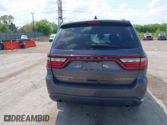 2014 Dodge Durango Citadel with VIN 1C4RDJEG0EC978611, listed as a IAAI auction lot 42250344 with 200,412 mi miles and . Bid and sale history available at DreamBid. Image 17.