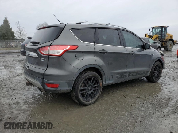 2015 Ford Escape Titanium with VIN 1FMCU9J92FUA62323, listed as a Copart auction lot 85826724 with 108,315 mi miles and Salvage Title. Bid and sale history available at DreamBid. Image 3.