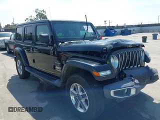 2020 Jeep Wrangler Unlimited Sahara with VIN 1C4HJXEN6LW235159, listed as a IAAI auction lot 42045083 with 68,400 mi miles and . Bid and sale history available at DreamBid. Image 1.