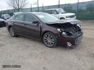 2014 Toyota Avalon Limited with VIN 4T1BK1EB8EU109398, listed as a IAAI auction lot 41843832 with 138,405 mi miles. Bid and sale history available at carsss.com. Image 1.