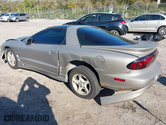 2000 Pontiac Firebird Firebird z VIN 2G2FS22K0Y2112410, wystawiony jako IAAI lot #41676541 z przebiegiem 129 857 mil mil oraz . Historia ofert i sprzedaży dostępna na DreamBid. Obrazek 3.