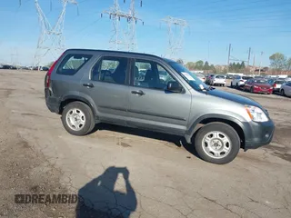 2006 Honda CR-V LX with VIN SHSRD78596U400596, listed as a IAAI auction lot 42064640 with 210,484 mi miles and . Bid and sale history available at carsss.com. Image 1.