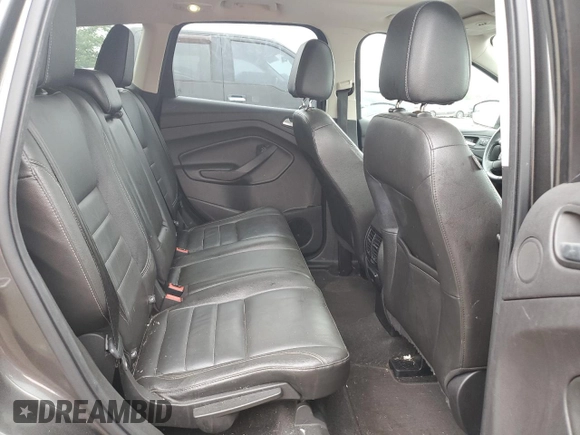 2016 Ford Escape Titanium with VIN 1FMCU9J95GUA58624, listed as a Copart auction lot 59915305 with 102,061 mi miles and Salvage title. Bid and sale history available at DreamBid. Image 11.