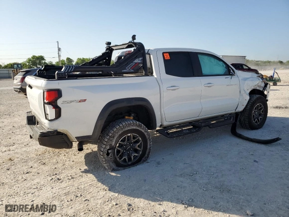 2024 Chevrolet Colorado 4WD ZR2 with VIN 1GCPTFEKXR1111908, listed as a Copart auction lot 52836865 with 25,106 mi miles and Salvage Title. Bid and sale history available at carsss.com. Image 3.