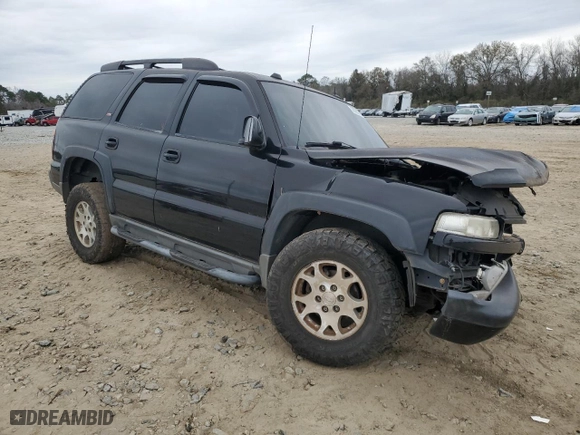 2005 Chevrolet Tahoe Z71 with VIN 1GNEC13T05R272325, listed as a Copart auction lot 39280284 with 155,434 mi miles and Salvage Title. Bid and sale history available at carsss.com. Image 4.