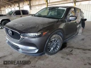 2020 Mazda CX-5 Touring with VIN JM3KFACMXL1852969, listed as a Copart auction lot 53150915 with 97,892 mi miles and Salvage Title. Bid and sale history available at carsss.com. Image 1.