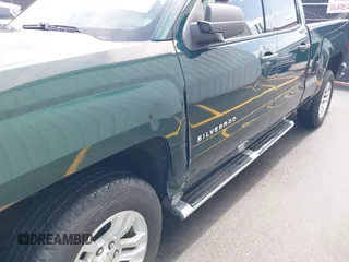 2014 Chevrolet Silverado 1500 LT with VIN 1GCRCREH2EZ323115, listed as a IAAI auction lot 42055949 with 61,337 mi miles and . Bid and sale history available at DreamBid. Image 6.