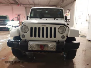 2014 Jeep Wrangler Unlimited Sahara with VIN 1C4BJWEG1EL326605, listed as a IAAI auction lot 41325037 with 135,824 mi miles. Bid and sale history available at carsss.com. Image 12.