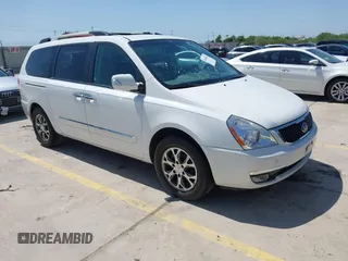 2014 Kia Sedona EX with VIN KNDMH4C76E6554982, listed as a IAAI auction lot 41980362 with 164,380 mi miles and . Bid and sale history available at carsss.com. Image 1.