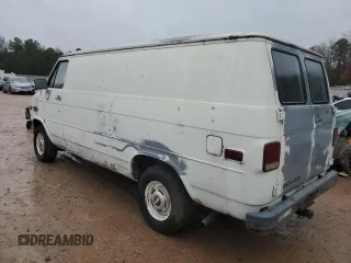 1986 Chevrolet Chevy Van z VIN 1GCEG25N0G7172290, wystawiony jako Copart lot #84010474 z przebiegiem 90 574 mil mil oraz Czysty tytuł • Clean title. Historia ofert i sprzedaży dostępna na DreamBid. Obrazek 2.