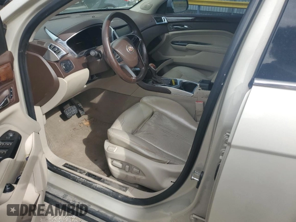 2014 Cadillac SRX Luxury Collection with VIN 3GYFNBE31ES631523, listed as a Copart auction lot 49661725 with 157,205 mi miles and Salvage Title. Bid and sale history available at DreamBid. Image 7.
