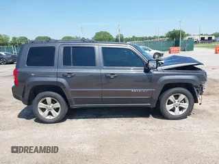 2014 Jeep Patriot Latitude with VIN 1C4NJRFB4ED799037, listed as a IAAI auction lot 42458807 with 105,936 mi miles and . Bid and sale history available at DreamBid. Image 14.