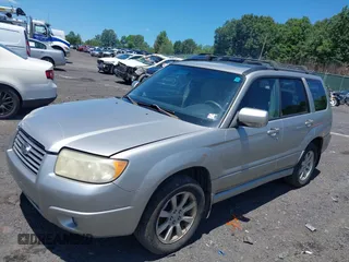 2007 Subaru Forester X with VIN JF1SG65617H725645, listed as a IAAI auction lot 42660092 with 123,228 mi miles and . Bid and sale history available at DreamBid. Image 2.