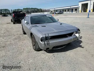 2014 Dodge Challenger SXT with VIN 2C3CDYAG7EH127105, listed as a Copart auction lot 45927195 with 133,151 mi miles and Salvage Title. Bid and sale history available at carsss.com. Image 10.