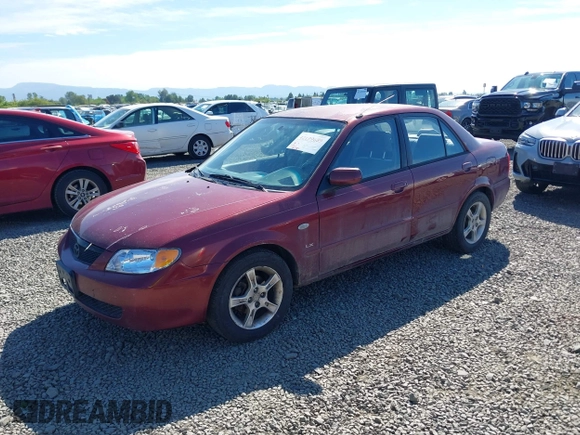 2003 Mazda Protege DX with VIN JM1BJ225930195479, listed as a IAAI auction lot 42199689 with 148,382 mi miles and . Bid and sale history available at DreamBid. Image 2.