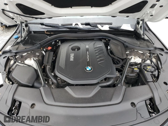2016 BMW 7 Series 740i with VIN WBA7E2C52GG547112, listed as a Copart auction lot 63069355 with 76,867 mi miles and Salvage title. Bid and sale history available at DreamBid. Image 11.