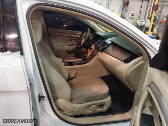 2014 Ford Taurus SE with VIN 1FAHP2D87EG182990, listed as a IAAI auction lot 41582146 with 125579 miles. Bid and sale history available at carsss.com. Image 5.