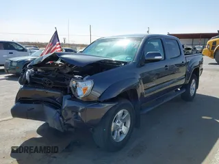 2014 Toyota Tacoma PreRunner with VIN 3TMJU4GN0EM164077, listed as a IAAI auction lot 41712542 with 69,443 mi miles. Bid and sale history available at carsss.com. Image 2.