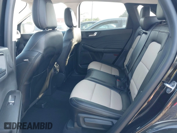 2021 Ford Escape Titanium Hybrid with VIN 1FMCU9DZ0MUB14833, listed as a IAAI auction lot 42593983 with 51,852 mi miles and . Bid and sale history available at DreamBid. Image 8.