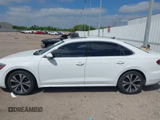 2021 Volkswagen Passat SE with VIN 1VWSA7A30MC000802, listed as a IAAI auction lot 42007087 with 190,171 mi miles and . Bid and sale history available at DreamBid. Image 14.