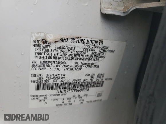2011 Lincoln MKS EcoBoost z VIN 1LNHL9FT7BG609026, wystawiony jako Copart lot #47574345 z przebiegiem 162 409 mil mil oraz Szkoda całkowita • Salvage title. Historia ofert i sprzedaży dostępna na DreamBid. Obrazek 13.