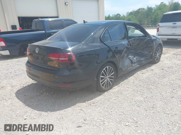 2016 Volkswagen Jetta Sport z VIN 3VWD17AJ9GM259251, wystawiony jako IAAI lot #42061241 z przebiegiem 183 325 mil mil oraz . Historia ofert i sprzedaży dostępna na DreamBid. Obrazek 4.