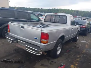 1996 Ford Ranger XL with VIN 1FTCR10A1TTA64228, listed as a IAAI auction lot 41944707 with 218,656 mi miles. Bid and sale history available at carsss.com. Image 4.