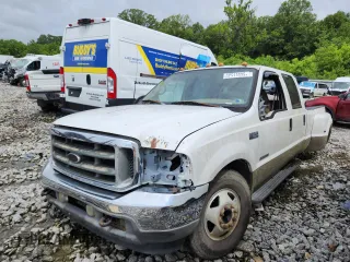 2001 Ford F-350 XL with VIN 1FTWW32F11EB16761, listed as a Copart auction lot 62511635 with 257,065 mi miles and Salvage title. Bid and sale history available at DreamBid. Image 1.