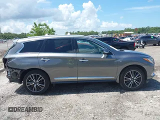 2019 Infiniti QX60 Pure with VIN 5N1DL0MNXKC512120, listed as a IAAI auction lot 42552676 with 88,944 mi miles and . Bid and sale history available at DreamBid. Image 13.